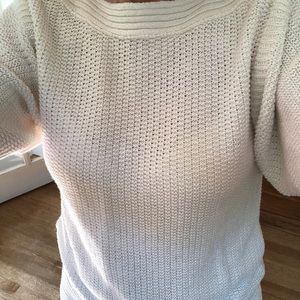 White cotton sweater.